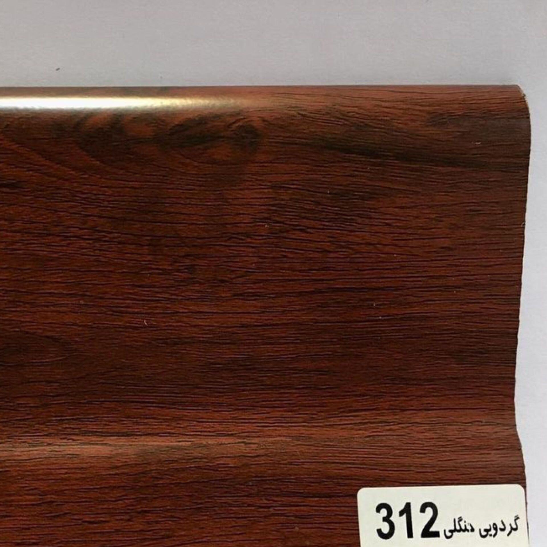 قرنیز پی وی سی طرح چوب گردویی جنگلی کد 312 قرنیز پی وی سی طرح چوب گردویی جنگلی کد 312